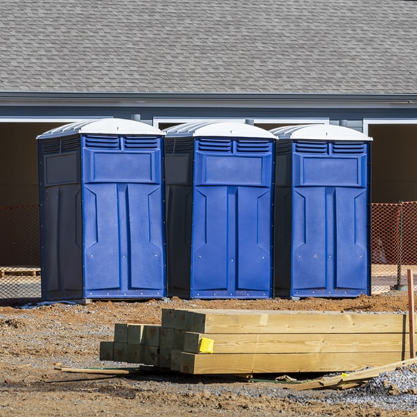 how often are the portable restrooms cleaned and serviced during a rental period in Ashland